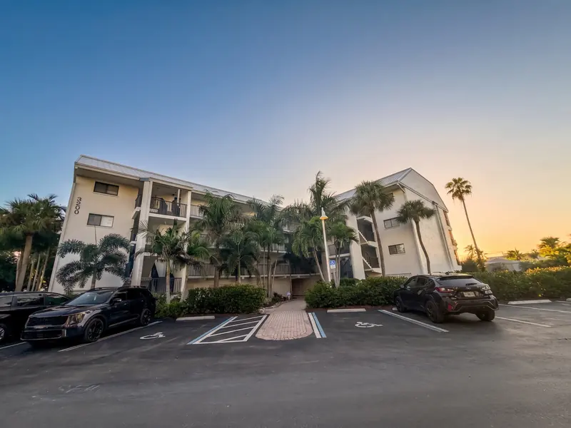 Captiva Resort Villas building and on-site parking at dusk
