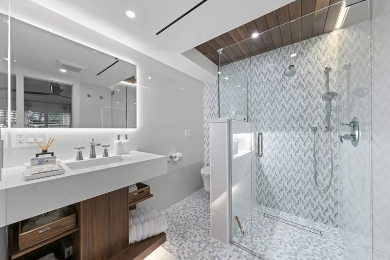 Spa-inspired bathroom with walk-in glass shower